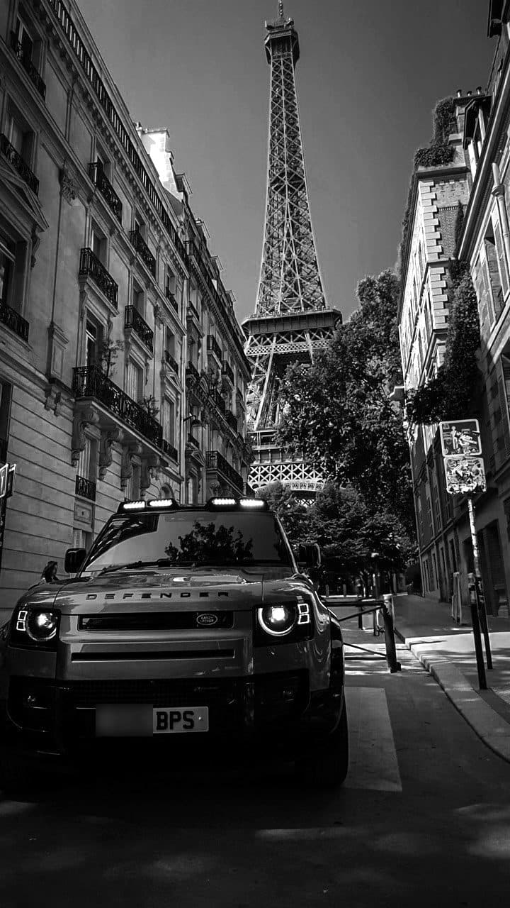 A BPS Defender on a Paris street, the Eiffel Tower behind