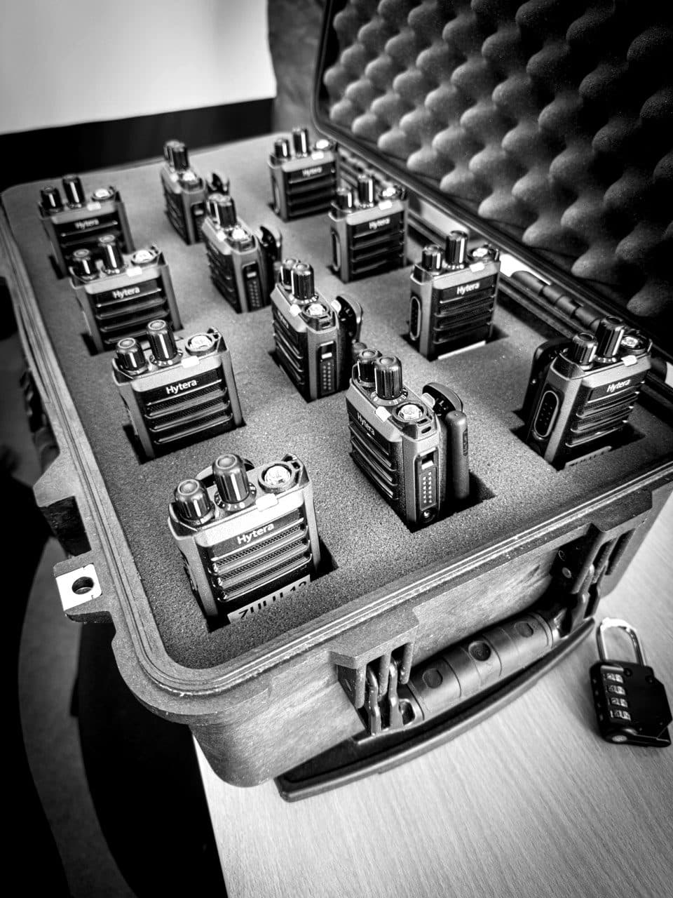A case of radios laid out for a training exercise