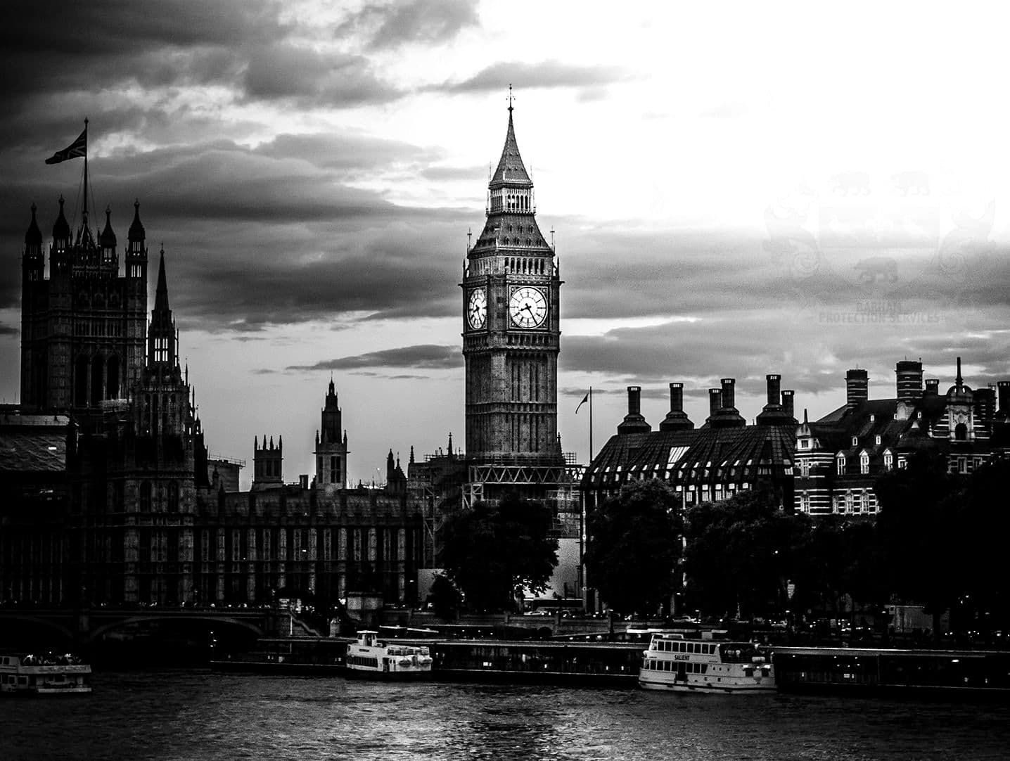 The Palace of Westminster and Elizabeth Tower from across the Thames at dusk